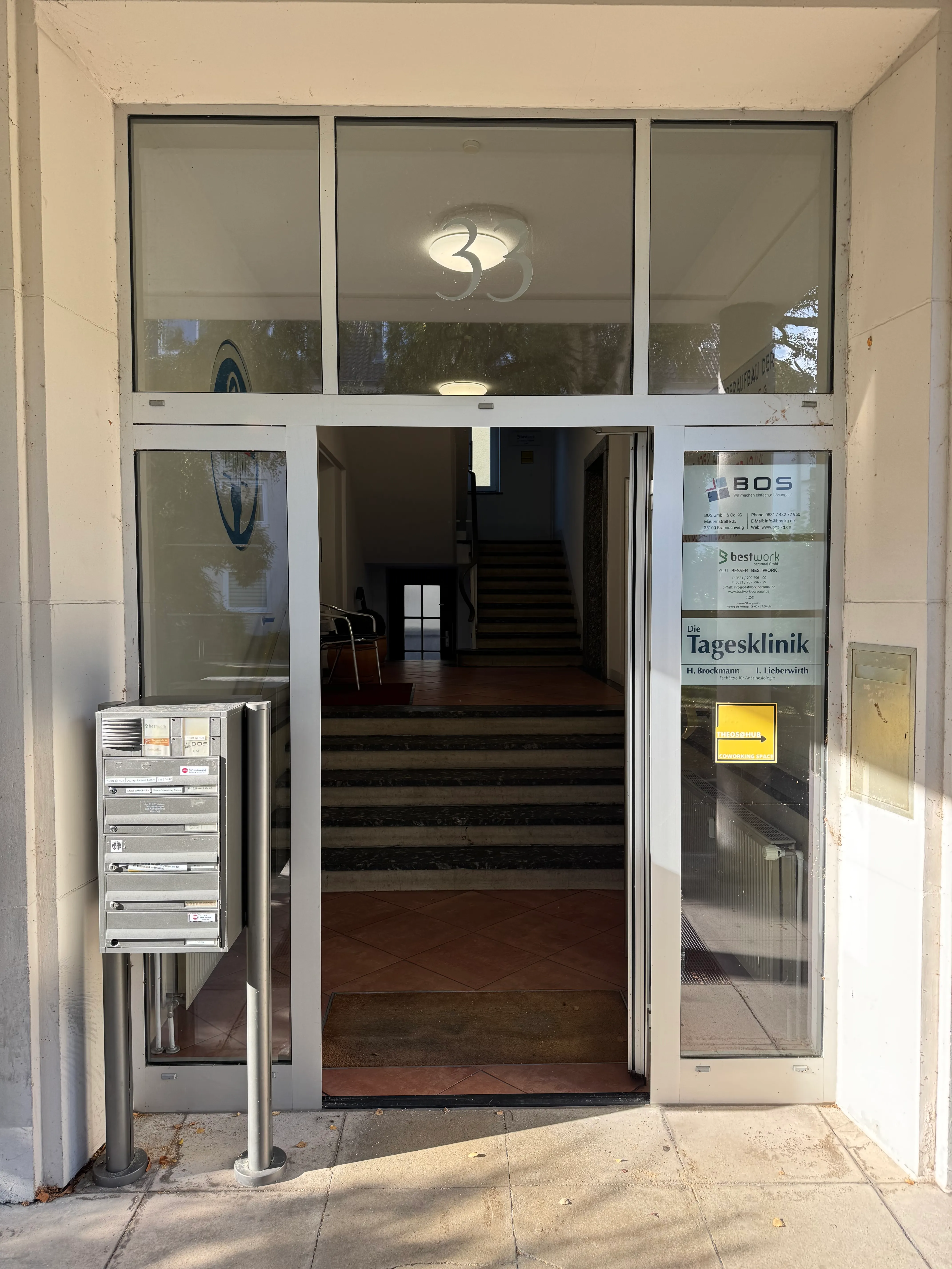 The main entrance into the building where Theo's Coworking space is